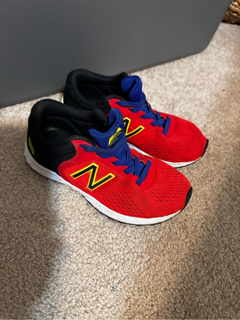 New Balance Kids Red, Blue & Black Athletic Sneakers with Yellow Logo